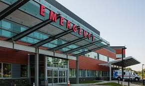 A hospital emergency room with the word " emergency " on it.